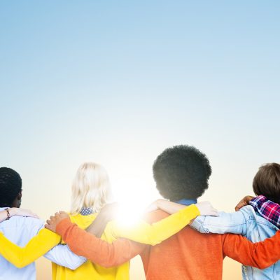 A group of people standing next to each other.